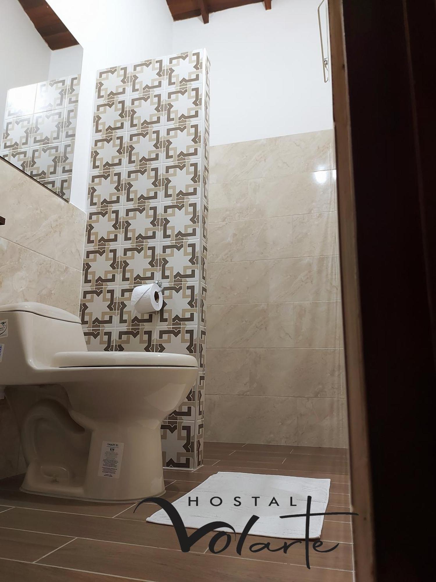 Volarte Hostal Jardin Bagian luar foto